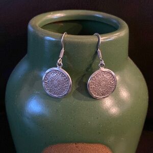 Sterling silver Mayan calendar earrings.